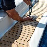 Marine detailing in progress on yacht
